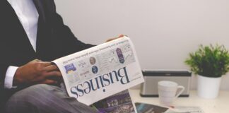 The hand rail is going a little faster than the moving sidewalk.